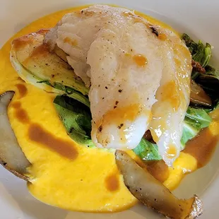 Grouper served over Bok Choy and Potatoes with pureed Butternut Squash sauce. YUMMY YUM YUM!