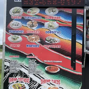 a food truck with menus