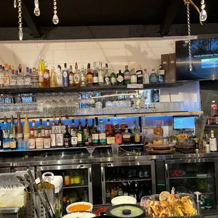 a counter with food and drinks