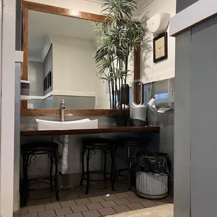 Cute bathroom vanity with stools