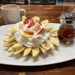Belgian Waffle. Every year they pile on more fruits, and provide syrup, as if this dulcet dish was detracted by a want of sugar.