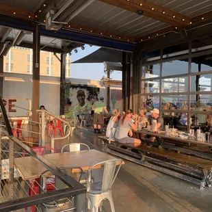 a group of people eating at a restaurant