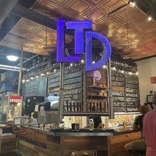 a bar with a neon sign