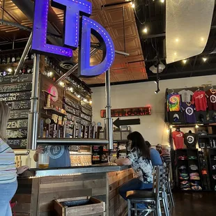customers sitting at the bar