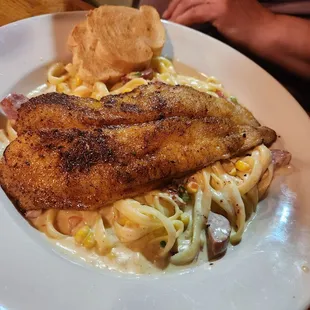 Blackened catfish fettuccine corn macque choux
