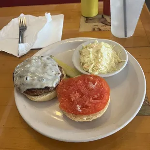This is the cheeseburger that I ordered with mayonnaise and tomato tomato is the best part