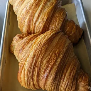 two croissants on a tray