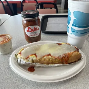 A mozzarella lubi with mayo, mustard, and hot peppers. Side of potato salad.