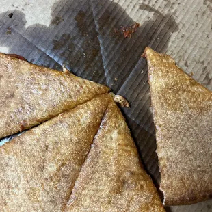 Greasy, undercooked, I wish you could feel the photo.