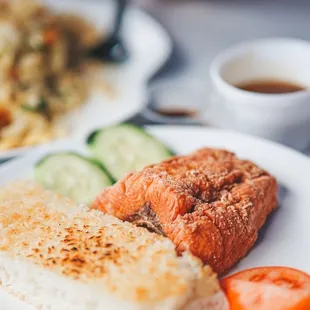 Grilled Salmon with crispy rice ( IG : @janimal.ca)