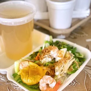 a plate of food and a drink