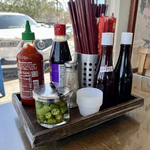 a tray of condiments and condiments