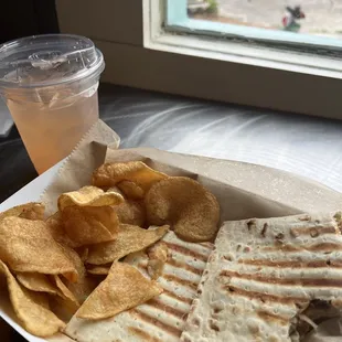 Chicken panini with a watermelon lemonade.