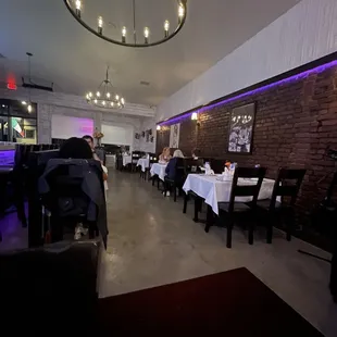 a dining room with a chandelier