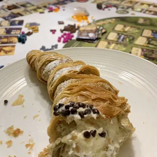 Lobster Tail (a curvy cone-shaped flakey pastry filled with Bavarian cream and ricotta cheese)