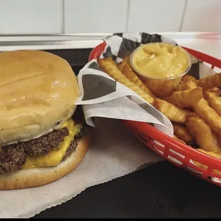 Double cheeseburger with fries and cheese