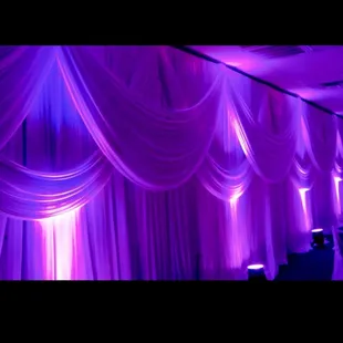 Fabric draping w/ lights.soooooo pretty! Lucas Event Center did this for an event &amp; I'm going w/ this wow factor @ our party!