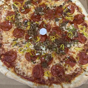 Meat and veggie pizza