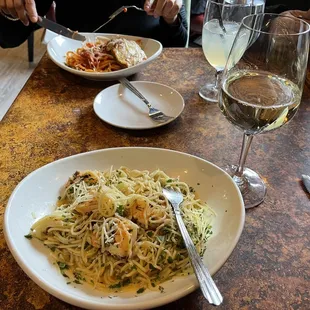Angel Hair Shrimp Scampi Lunch, Eggplant Parmesan Lunchand a glass of Sauvignon blanc
