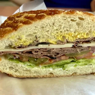 Roasted beef with Swiss on Dutch $12,00 (hella good!)