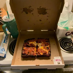 This is their pan crust pizza. Completely burnt on the edges and some toppings, lacked toppings and mainly dough (bread) for $40.