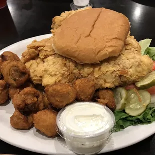 Breaded pork tenderloin sandwich with breaded mushrooms