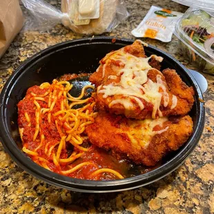 Take out, chicken parm dinner... $20   Where&apos;s the spaghetti?!? They will charge you more for something you already should have got!