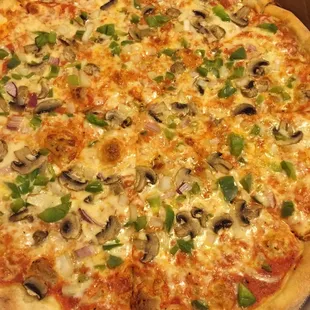 Large pizza with green peppers, onions, and mushrooms!