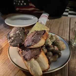 a plate of food on a wooden table
