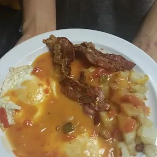 Number 1 breakfast plate! Huevos Rancheros with over easy eggs.