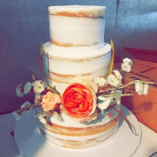 Naked wedding cake with fruit filling