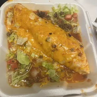 a meal in a styrofoam container