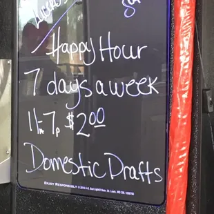 a happy hour sign