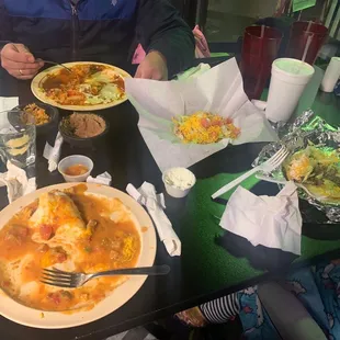 Great food! (Enchilada plate, taco, tostada, rice and beans)