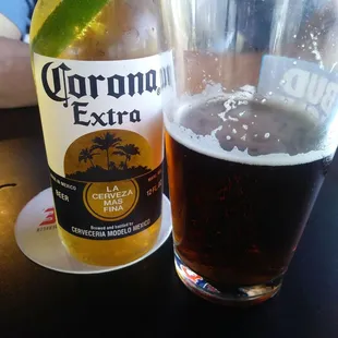 When at a Mexican restaurant - drink Mexican Beer. Corona and a lime and Dos Equis Amber on Tap.