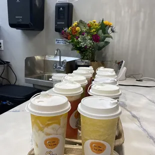 r cups of coffee on a table