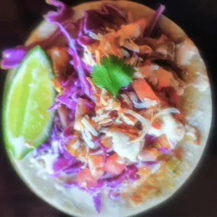 seafood taco of grilled shrimp, toasted coconut, cabbage, pico de gallo salsa.. Taco Tuesday !!