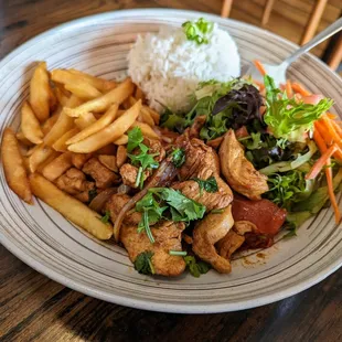 Pollo Saltado. $16.99. Stir-fried chicken, tomato, cilantro, onion. Served over fries with rice and salad.