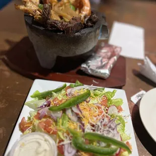 Molcajete and I substituted it with a salad instead of the rice and beans.