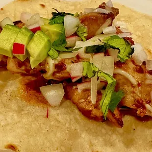 Grilled Chicken taco with added avocado