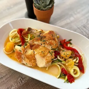 Seared chicken breast served with zucchini, marinated tomato &amp; peppers (July 2022 Menu)