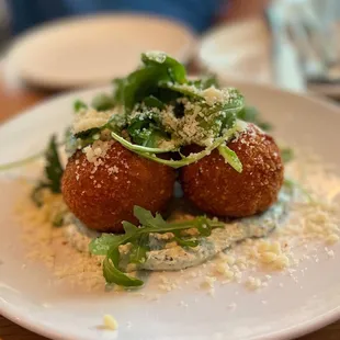 Ragu stuffed arancini with homemade ricotta