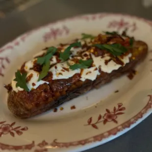 Crostini with spreadable pepperoni with talleggio