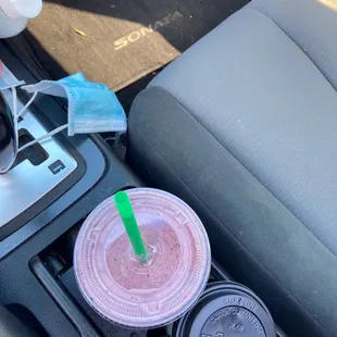 a drink in a cup with a straw