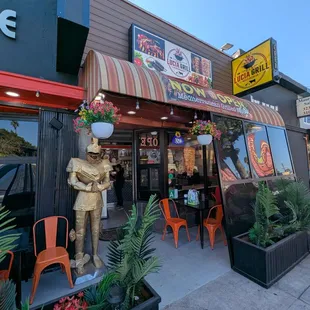 Outdoor, let me get seating and a hookah bar next door