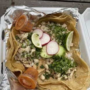 Chicken Street Tacos with red sauce.