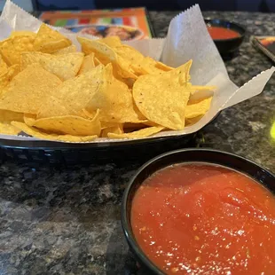 Warm chips and spicy salsa