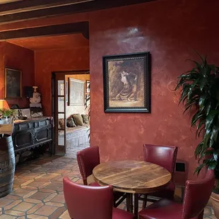a dining room with a wine barrel