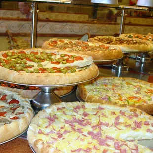 pizzas on display