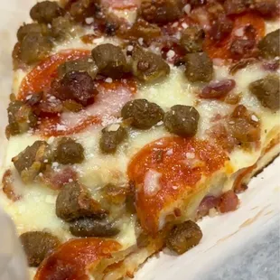 Meat Lovers slice - $9
